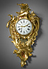 A very beautiful and rare Louis XV gilt bronze cartel clock of eight day duration, signed on the white enamel dial and on the movement Ageron à Paris